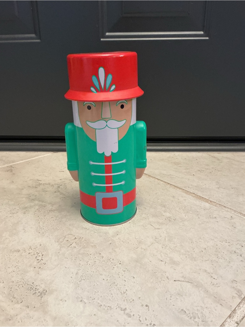 Green and Red Nutcracker Tin canister, 9 x 3.5 x 3.5